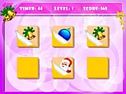 Screenshot of the Christmas Memory Match game board showing multiple flipped cards with images of Santa, reindeer, and colorful Christmas gifts