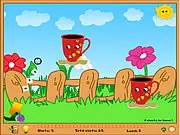 Screenshot of the Tea Party physics puzzle game, showing a sugar-shooting cannon aiming at a teacup across a series of obstacles, free online aiming game