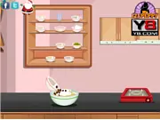 Screenshot from the Icelandic Christmas Cake online game, showing virtual kitchen tools and cake ingredients.