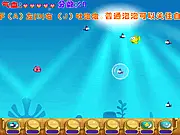 Little Fish Adventure free online game screenshot showing a small orange fish swimming in the ocean next to a variety of smaller and larger marine life