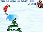 Snowboarding Santa game screen showing Santa on a snowboard collecting gifts and avoiding trees and water obstacles on a snowy slope