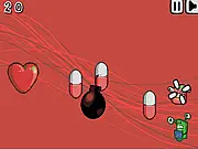 HeartAttack game screenshot, using the mouse to click and eliminate cartoon viruses attacking a human heart icon