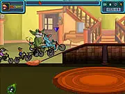 The character Oggy the Cat driving a small racing kart on a track, trying to collect a piece of chicken while being chased by cockroaches in the game Oggy the Racing