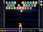 The Avengers Space Cannon gameplay screenshot showing the cannon aiming at bubbles with Marvel superhero clone faces.