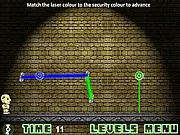 Screenshot of the Dummy Escape game showing a crash test dummy blocked by red laser fences and the puzzle pieces needed to redirect the beam
