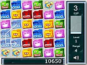 Computer screen showing a grid of green, red, and blue colored folders with a mouse cursor selecting a group of matching folders in the puzzle game Folder Mania