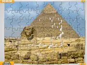 Screenshot of World Wonders Jigsaw Puzzle online game showing the incomplete image of The Great Wall of China and various puzzle pieces