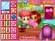 Toto's Sweet V-Day online game screen showing the adorable dog making and serving colorful lollipops for Valentine's Day