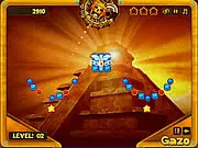 Totem Balls free game screenshot, showing a cannon aiming at a stack of colored totem balls, with a red ball at the base