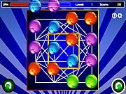 Magic Marbles puzzle game screen showing a grid of different colored marbles and rotational controls