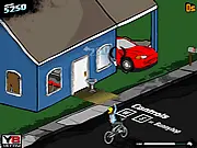 Screenshot of Newspaper Boy 2, showing a mischievous boy on a bicycle preparing to throw a stick of dynamite toward a suburban house. Play the free online demolition game.