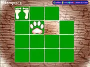 Animal Footprint Pairs game screenshot showing various animal tracks and prints on flipped cards, free online memory matching game