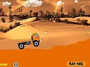 Free online game thumbnail for Desert Truck Race, showing a large red off-road truck launching over a massive sand dune in the desert.