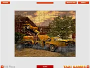 Screenshot of Crash Taxi Puzzle game showing realistic picture pieces of a yellow taxi scattered on the screen for the player to solve.