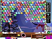 Bubble Shooter Christmas free online game screenshot showing a festive layout of red, green, and blue bubbles