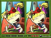 Rugrats Go Wild Spot the Difference game scene with characters Tommy, Chuckie, and Angelica on a jungle island.