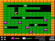 Gameplay screen of Crazy Digger showing the player character surrounded by green dirt tiles, a diamond, and a grey boulder