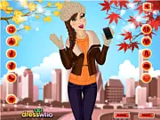 Screenshot from the Gloves Madness dress up game showing a model wearing a chic, layered outfit including a hat and stylish gloves.
