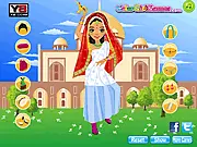 Indian Fashion free online dress up game screenshot, featuring a model in a traditional sari or lehenga, adorned with intricate gold jewelry.