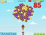 Screenshot of Bubble Sky online game showing colored bubbles clustered in the sky with a cannon aiming the next bubble from the bottom.