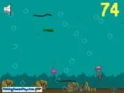 Play Fish Life free online survival arcade game featuring a small green fish dodging predators and objects