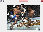 UFC Fighting Jigsaw online game screenshot showing mixed martial arts fighters in a puzzle format