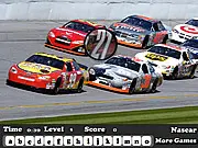 Nascar Hidden Letters game screen showing a picture of Nascar race cars on a speedway with several hidden letters overlaid.