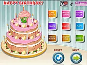 Happy Birthday Cake Decorations game screen, custom birthday cake being decorated with frosting and candles, play free online