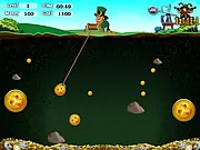 St Patricks Gold Miner free online game screen showing a mining claw swinging over gold coins and rocks