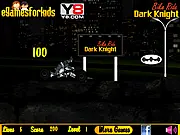The Dark Knight (Batman) riding his large, futuristic Bat-Bike at high speed through the rugged streets of Gotham City in an arcade racing game.