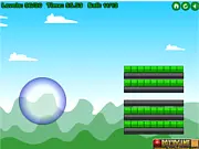 Screenshot of Super Bouncy Ball online game showing a bouncy ball ready to be launched at a stack of blocks on a platform