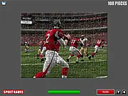 Screenshot of the NFL Puzzle free online game showing a partially completed jigsaw image of a famous NFL hero or player