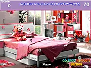 Online hidden alphabet game screenshot showing a cluttered girl's bedroom with toys and a bed, featuring hidden letters scattered around the scene.