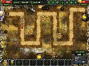 Screenshot of the Zombie TD tower defense online game showing defensive towers attacking a horde of cartoon-style zombies
