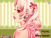 Screenshot of Fashion Earrings Designer showing a model's ear with multiple piercings and layered earrings, a close-up of different styled hoops and studs, the game's toolbar for selecting jewelry