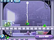 Play Experiments puzzle game online for free, showing a small green monster navigating physics obstacles in a laboratory.
