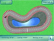Cool Racing online game screenshot showing a red top-down race car drifting around a corner on a track.