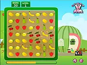 Screenshot of the Juicy Fruit puzzle game showing rows of apples, bananas, and strawberries on a grid, ready to be matched