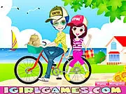 Screenshot of the Romantic Bike Lovers dress-up game showing the characters Bill and Jenny standing next to a bicycle with a beautiful seascape background