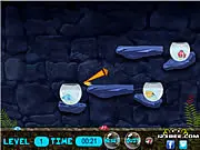Screenshot of Pair the Fish game showing two identical fish separated by an obstacle, with an arrow indicating the launch angle