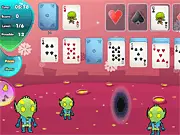 Gameplay screenshot of Space Odyssey Solitaire, showing the classic Klondike card layout with a space-themed background, featuring planets and stars.
