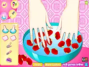 Manicure Salon free online game screenshot showing nail art and polish selection with hand accessories on PlayArcadeHub
