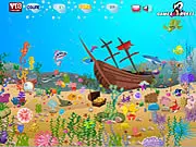 Screenshot of Underwater Life Span hidden object game, colorful coral and fish, free online point and click puzzle