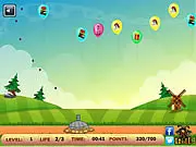Cannon Balloon Defense game screen, showing a cannon aiming at colorful balloons in the sky