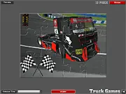 Screenshot of Racing Truck Jigsaw puzzle game in progress, showing a powerful yellow and blue racing truck image broken into many shuffled pieces.