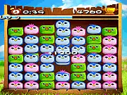 Birds Cross Beng game screenshot, showing cute cartoon birds preparing to be launched across a gap to hit a target