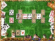 Kitten Solitaire online card game screenshot showing the classic Solitaire layout with kitten-themed cards and backgrounds