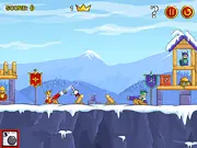 King's Game free online physics cannon shooter screenshot, player aiming a cannon at a medieval castle structure, war strategy game on PlayArcadeHub