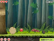 Red Ball 4 Volume 2 hero rolling through a deep forest level and jumping over an evil square enemy on PlayArcadeHub