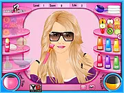 Gameplay screen from Celebrities Facial Spa Salon Online showing a celebrity client receiving a facial treatment with various spa tools